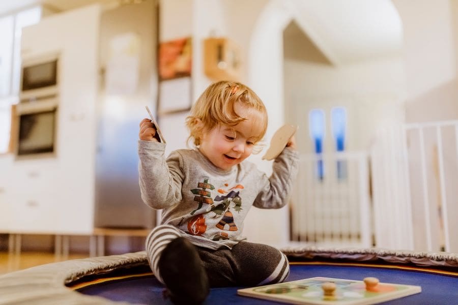 Toddler playing with puzzle